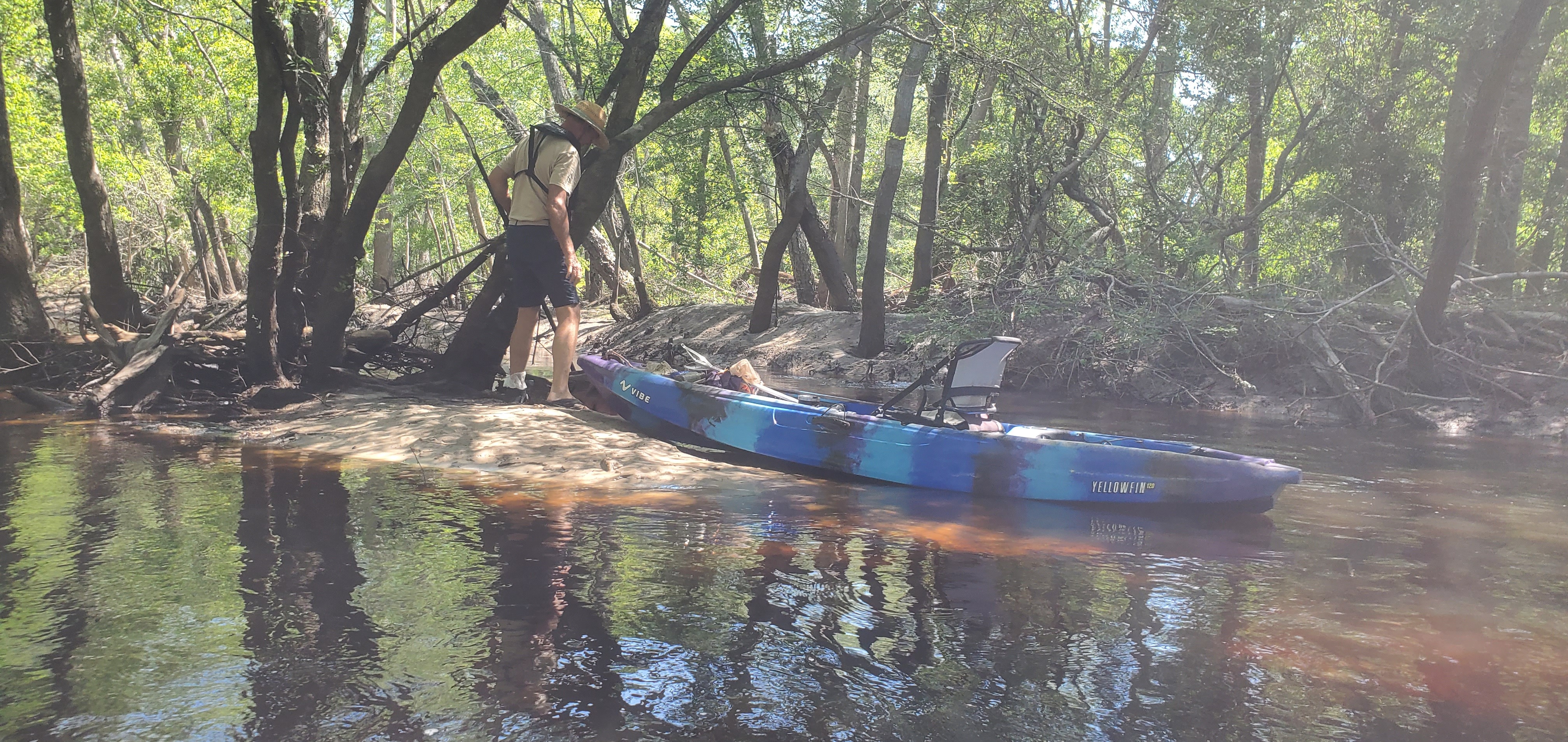 Steve Fesler retrieving a heavy child toy, 11:58:41, 30.8640951, -83.3206911