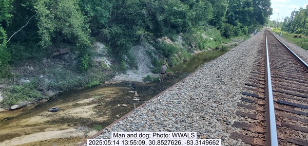 [Man and dog, 2025:05:14 13:55:09, 30.8527626, -83.3149662]
