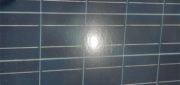 [Sun reflected in solar panels, 2025-06-20 --jsq for WWALS]