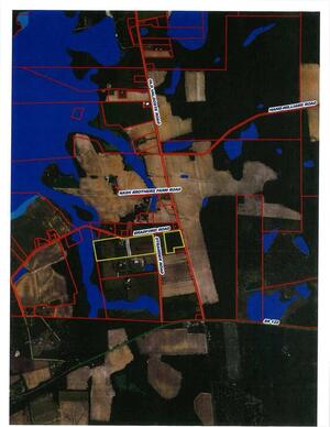 [Map: Aerial, roads and flood plain]