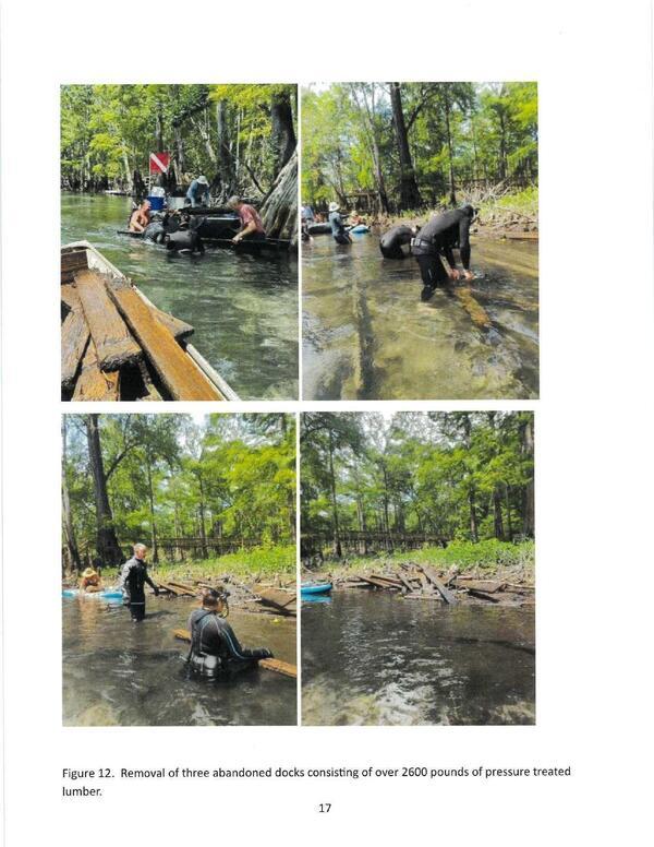 Figure 12. Removal of three abandoned docks consisting of over 2600 pounds of pressure treated lumber.
