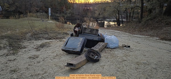 [Trash at Nankin Boat Ramp signs, 2025:11:22 17:53:36, 30.6748647, -83.3940020 --jsq for WWALS]