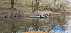 [Melissa puts the tire on Mica's kayak, 2025:11:22 12:34:41, 30.7001364, -83.4522109 --jsq for WWALS]