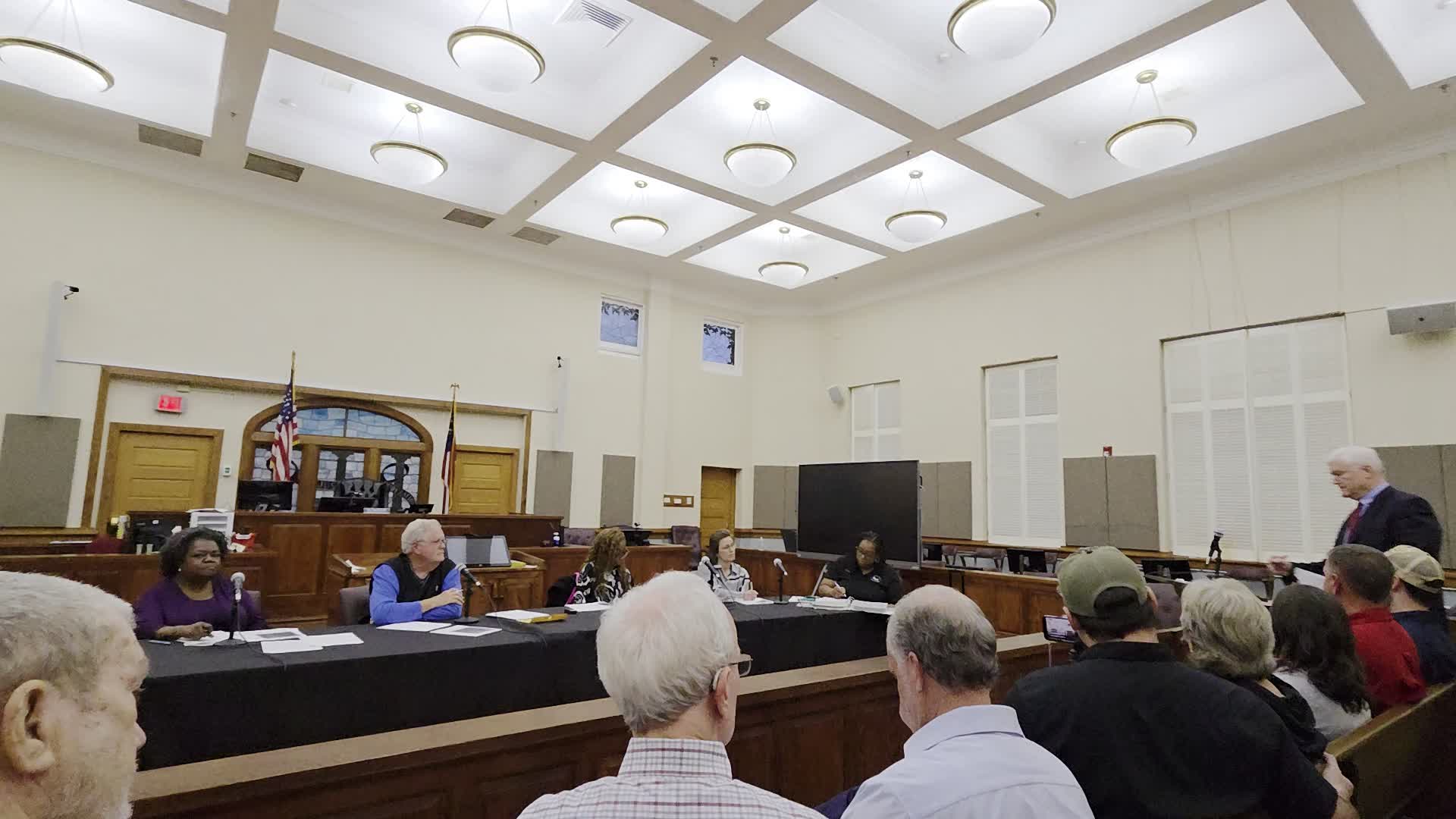 Movie: Johnny Spurlin, attorney in Tifton, speaking for a number of people, said tax revenue generation is irrelevant to a zoning analysis. Should apply the facts, but we don't know the facts. Said zoning ordinance says it's to protect the many from the few. Wait until there is an ordinance and specific facts and circumstances, so it can be controled. (329M)