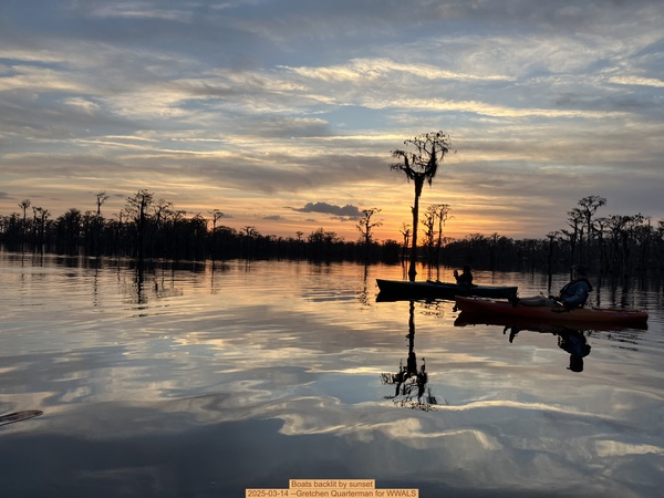 Boats backlit by sunset, 2025-03-14 --Gretchen Quarterman for WWALS
