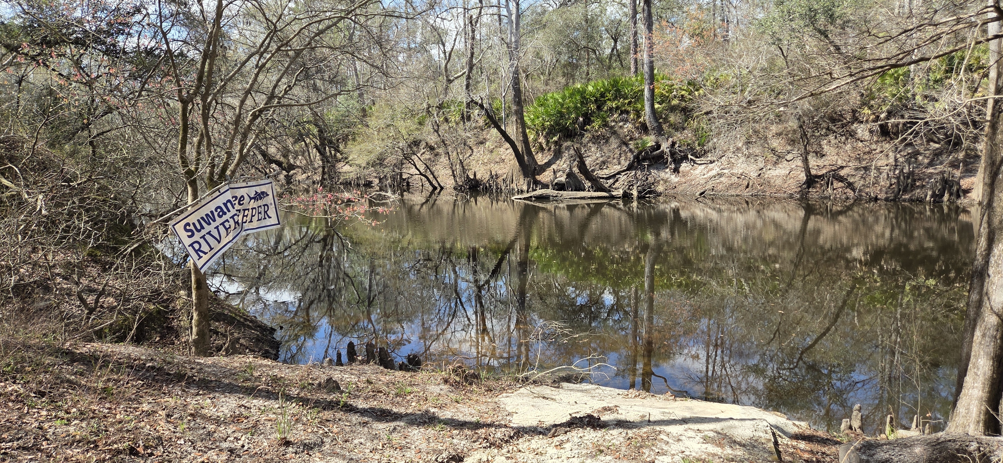 Lunch stop with Suwannee Riverkeeper banner, 2026:03:07 12:33:32, 30.8158819, -83.4246892 --jsq for WWALS