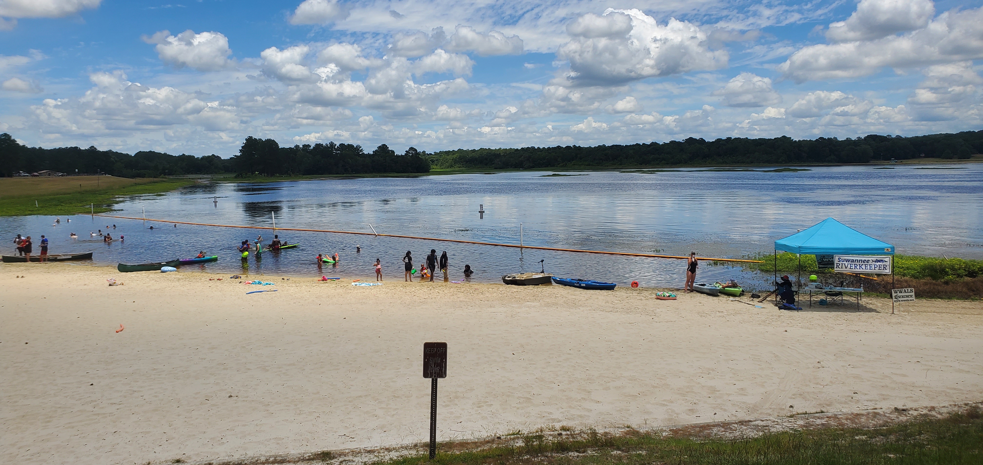 Tent, beach, boaters, from the pavilion, 2026-06-22, 13:23:54 --jsq for WWALS