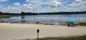 [Tent, beach, boaters, from the pavilion, 2026-06-22, 13:23:54 --jsq for WWALS]