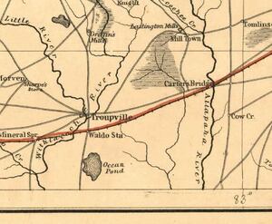 [Portion of Lowndes County Area, 1865, GeorgiaInfo, U.S. Coast Survey Map, Southern Georgia and Part of South Carolina, 1865 uses the current river names, but never heard of Valdosta or Statenville, and Troupville is still there, with the railroad bypassing it, yet “Waldo Sta.” on the railroad due south of Troupville. On the ALapaha, the railroad crosses on “Carter’s Bridge”.]