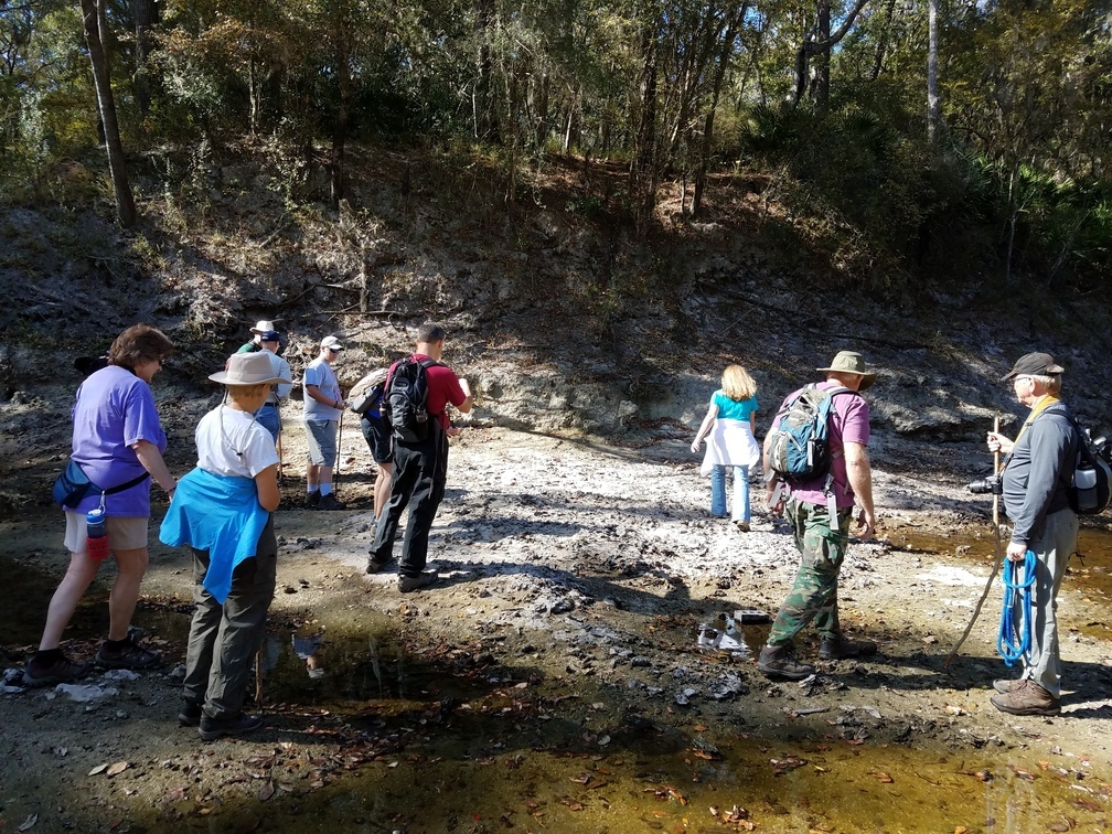 Lori listening to Dennis at the oyster beds, 30.5840251, -83.0505336