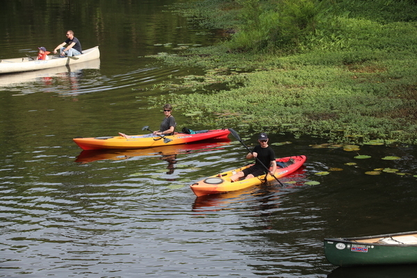 Twin color kayaks: Nikki York and Jay York