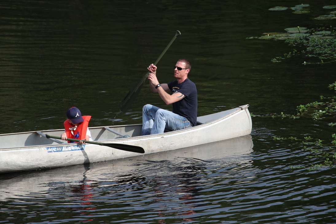 Diverse age pair paddlers