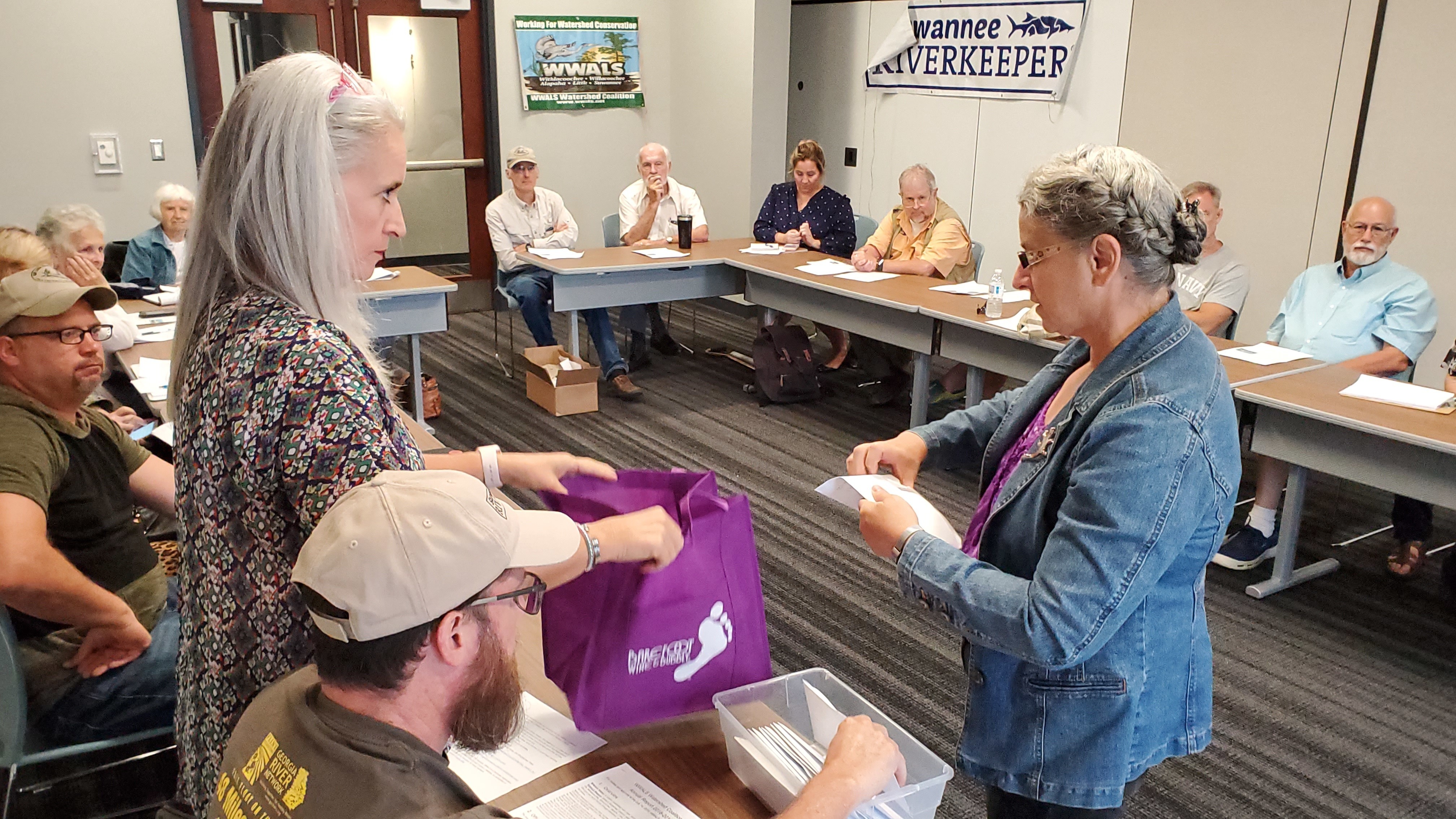 Trudy and Conn Cole help Gretchen Quarterman