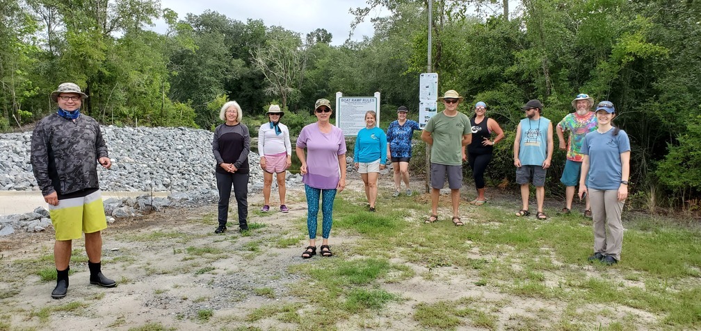 Paddlers with signs