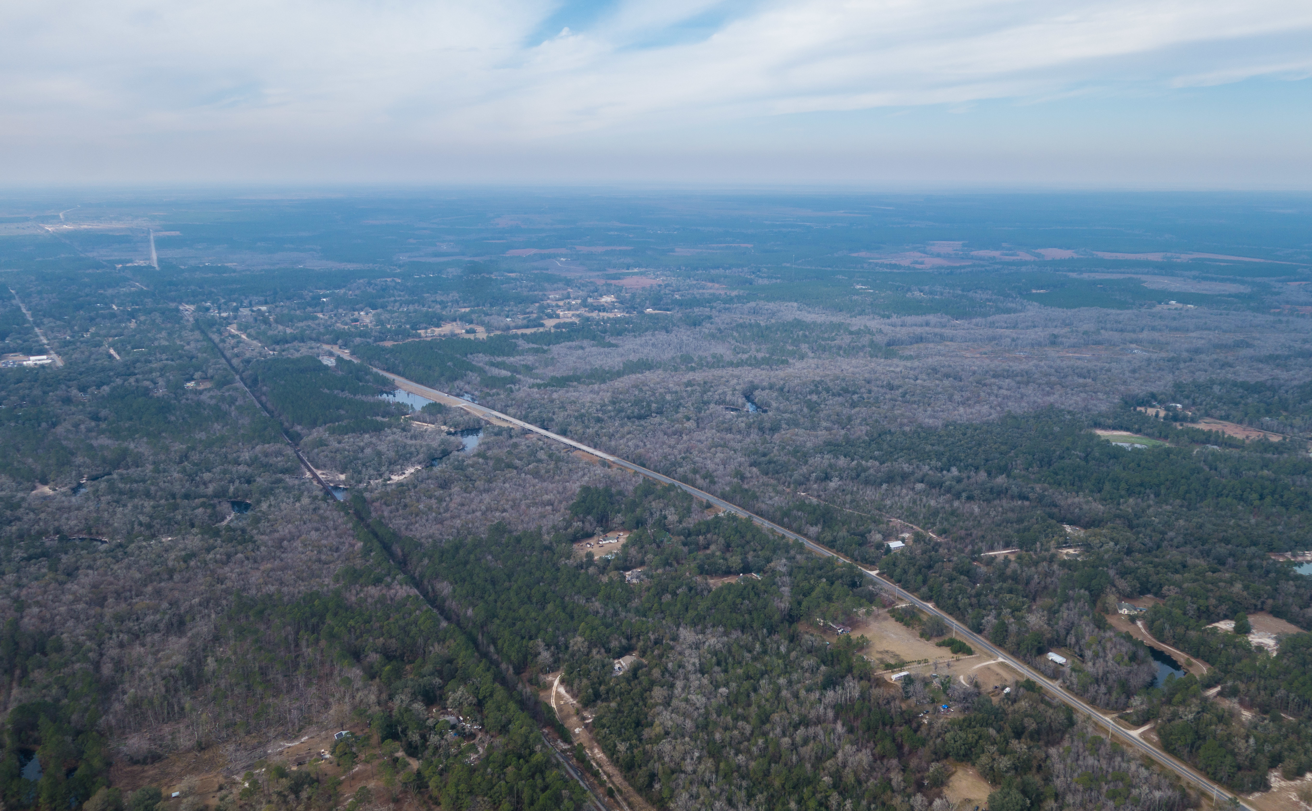 W: St Marys River, ONWR on horizon, 30.522534, -82.010397