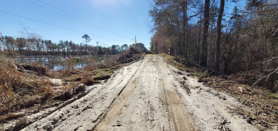 Sand before the inland bridge