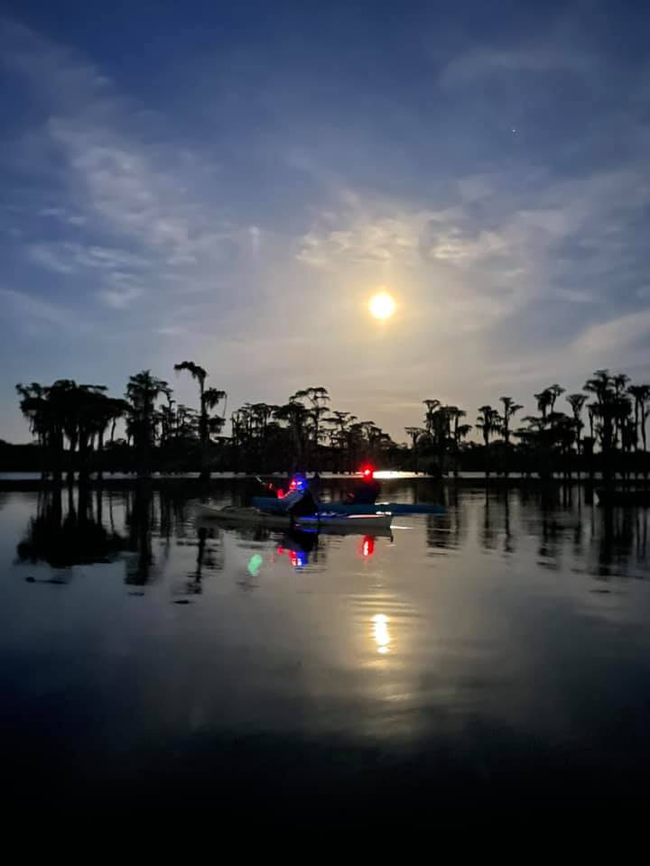 Moon over paddler lights