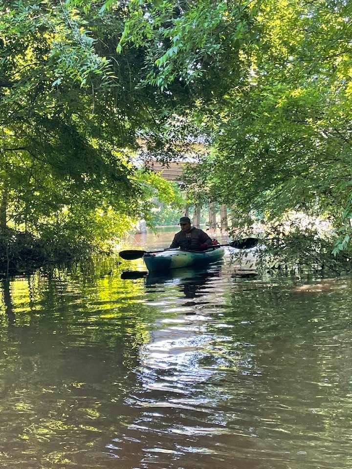 Russell under the limbs in front of US 41 bridge