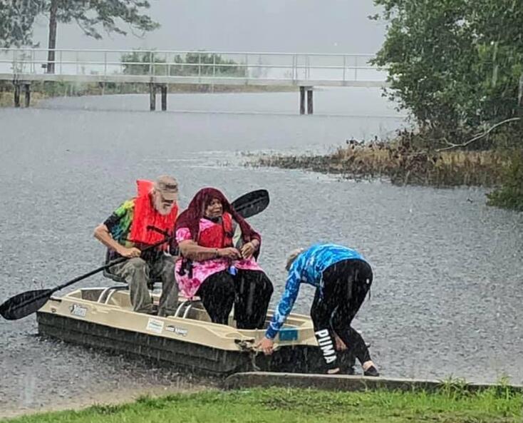 Fannie Gibbs getting into the lake