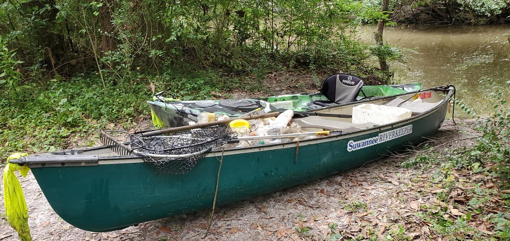 Trash in Suwannee Riverkeeper canoe, 13:35:31, 30.8621260, -83.3183910