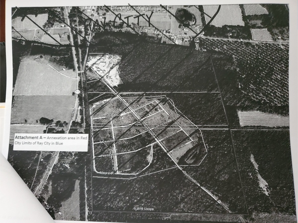 Attachment A: Annexation area in Red, City Limits of Ray City in Blue