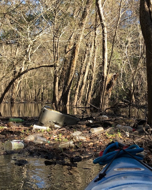 Cooler against log about 50 feet from Sugar Creek Confluence