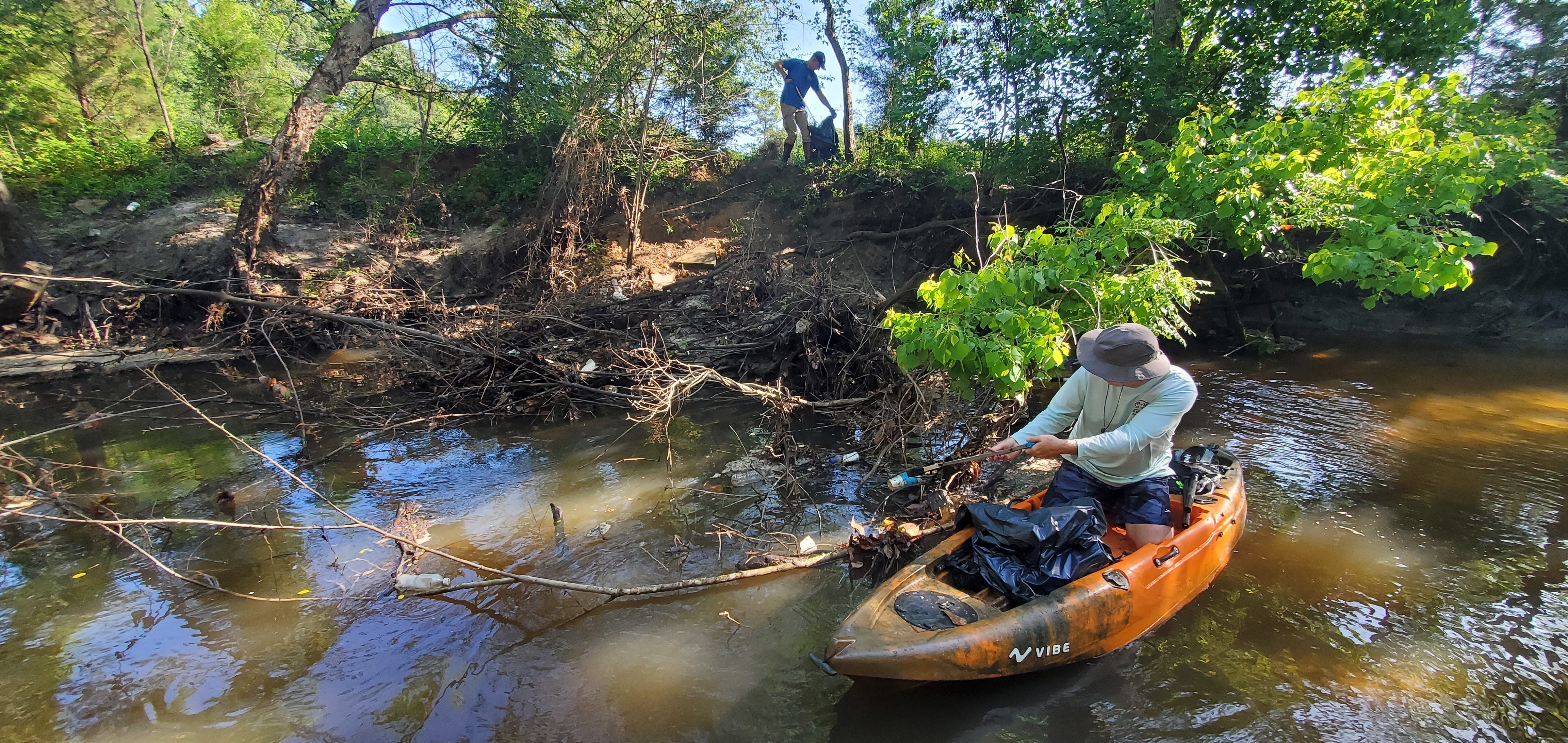 Rob Rickert on the bank, Scott James in the kayak, 09:26:50, 30.8634542, -83.3190523