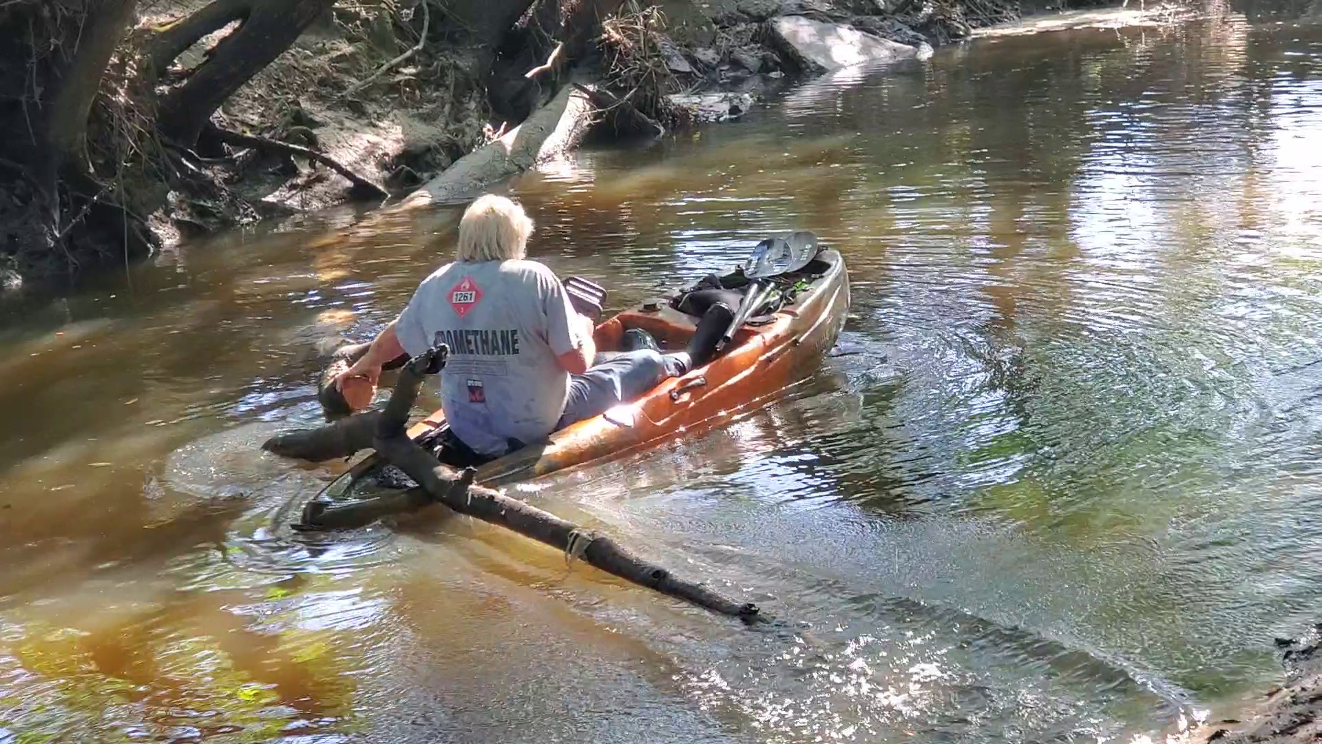 Movie: Phil Hubbard sawing a log in a kayak, 09:36:09, 30.8632605, -83.3193490 (71M)