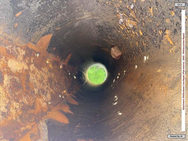 Photo: WWTP sewer line repair During (pipe interior)