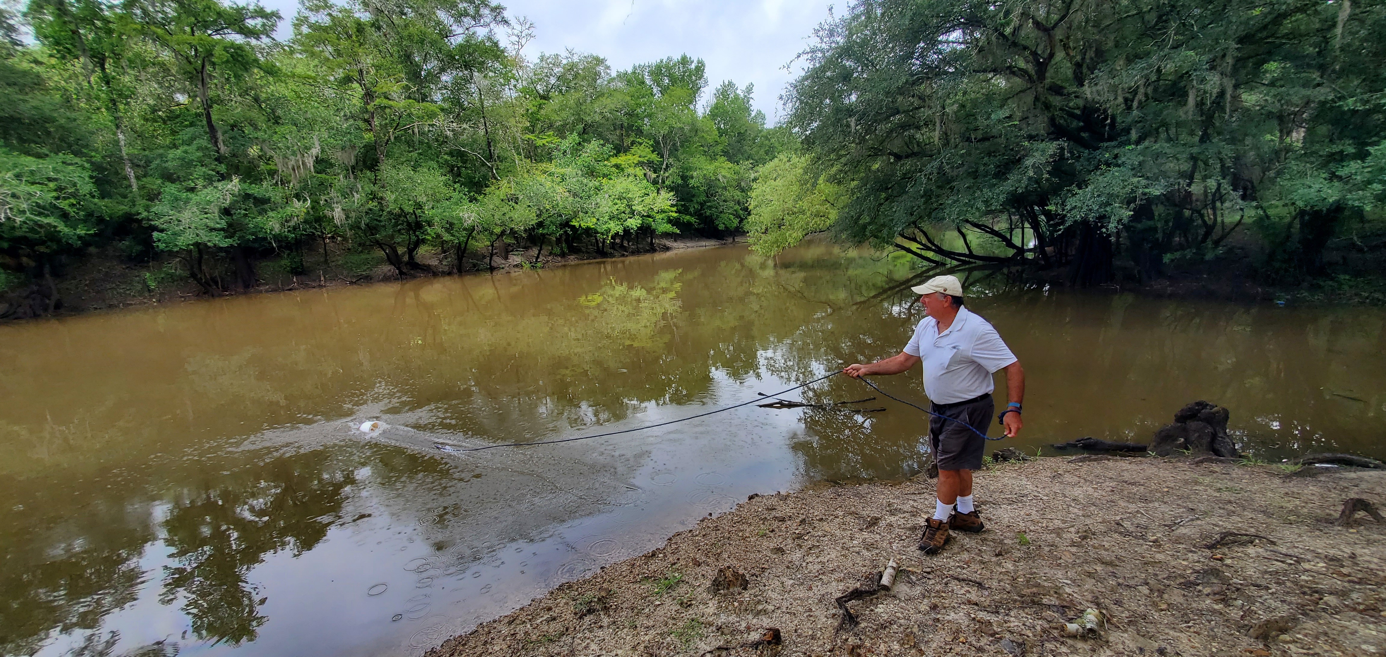 Michael Bachrach retrieving the sample bucket, 10:51:53, 30.7124383, -83.4555408