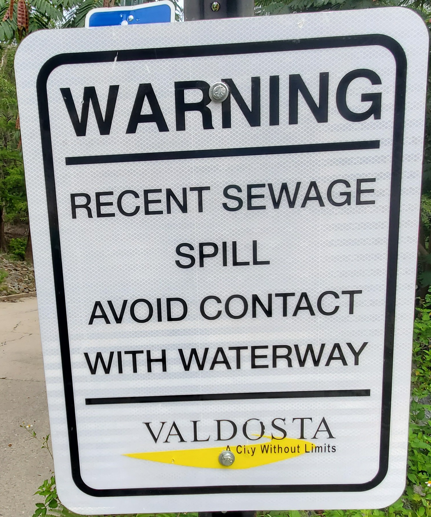 Valdosta sewage spill warning sign