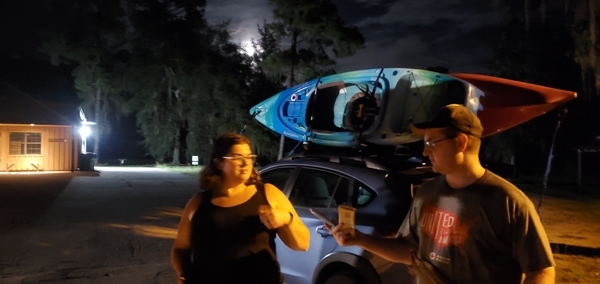 Elizabeth and John Brunner, Subaru, boats, moon