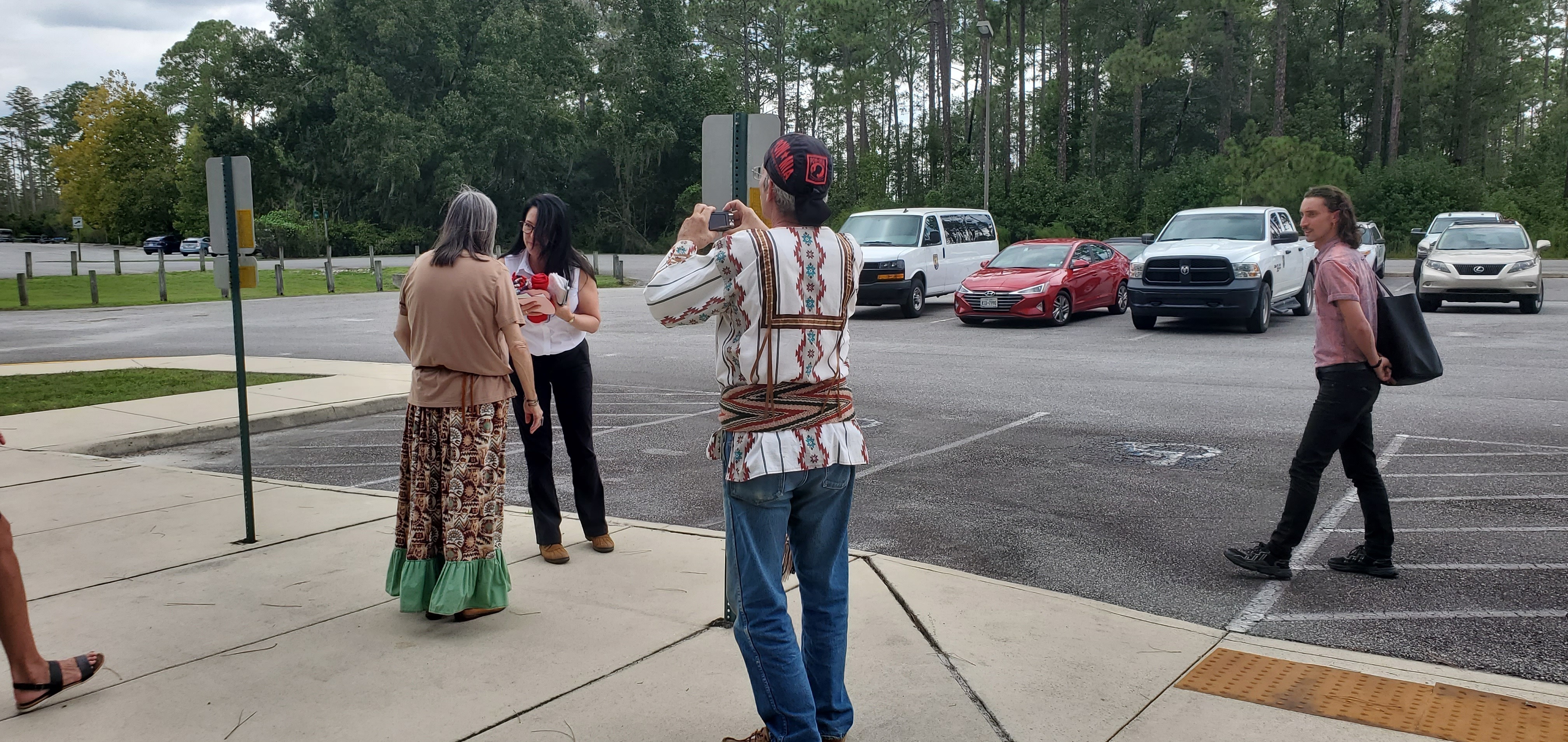 Deb Haaland Assistant accepts Cherokee Tribe gift from MarthaJane Winkler, 12:50:44, 30.7389991, -82.1393612