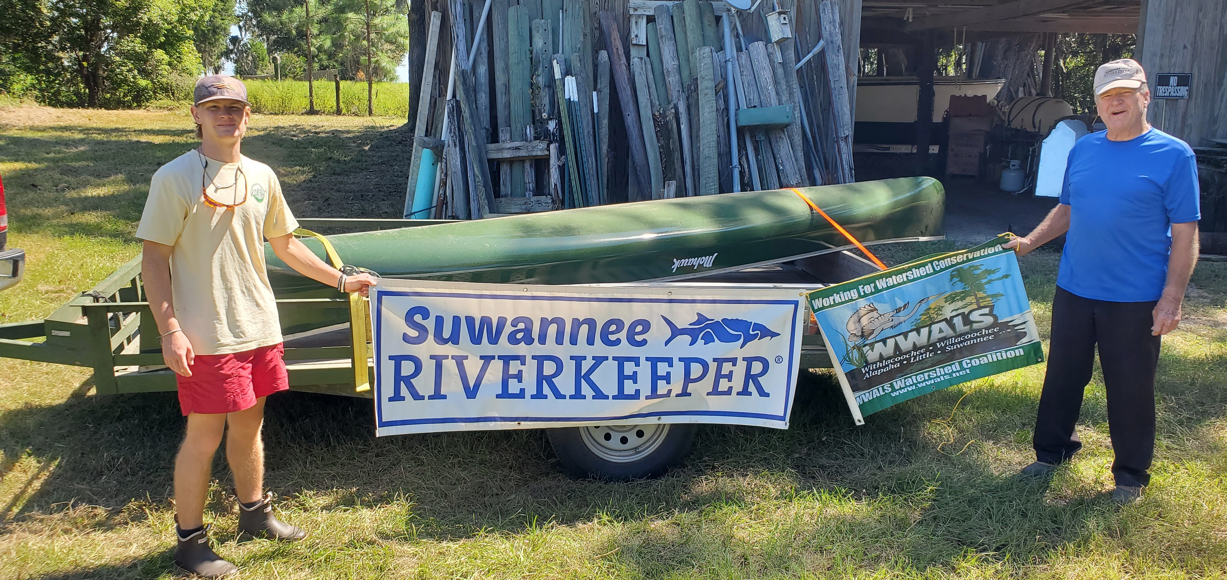 Parker Jones and Mark Wisenbaker with canoe