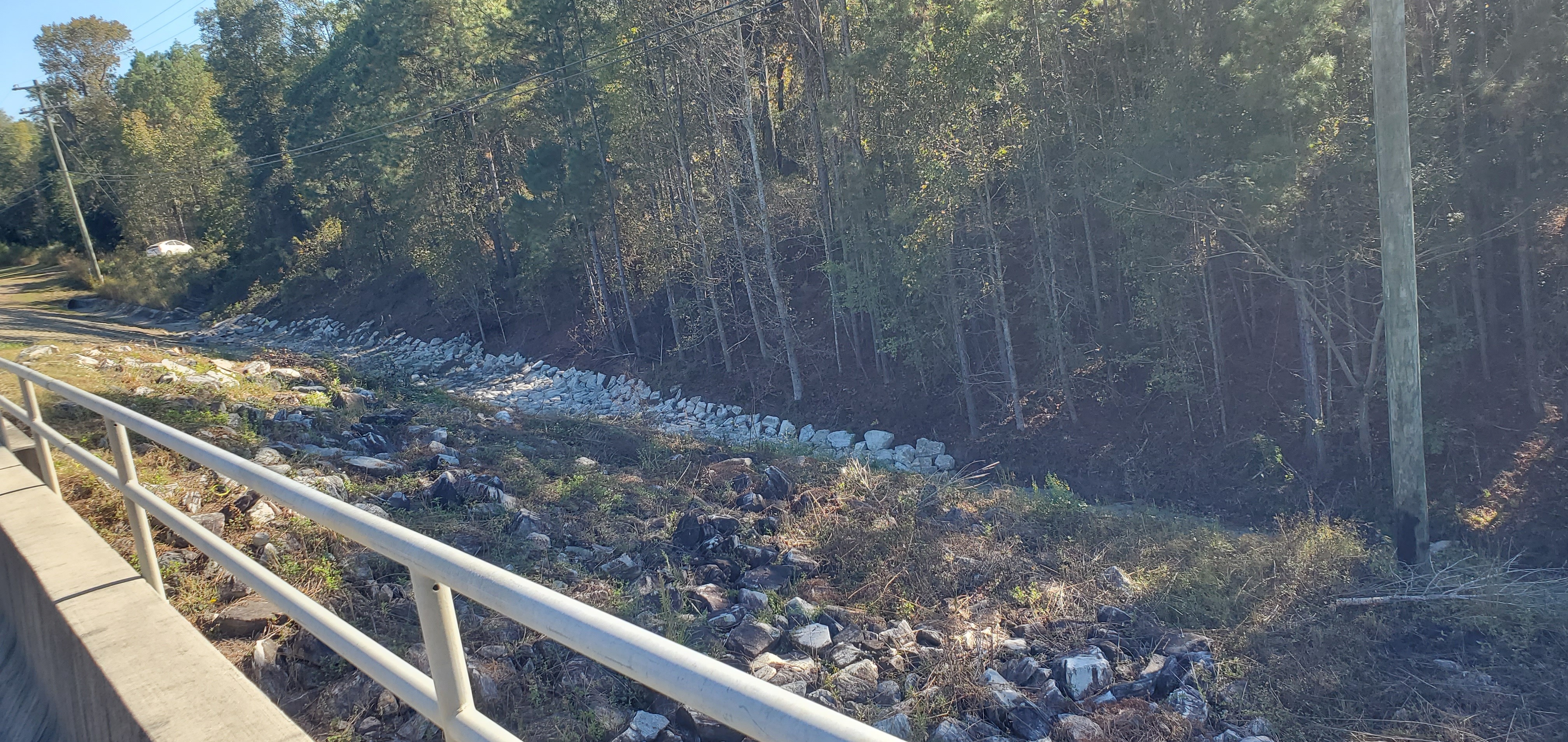 Closeup, rocks, drainage ditch, 15:38:45, 30.8499359, -83.3397056