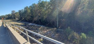 [Rocks along drainage ditch, 15:38:41, 30.8499359, -83.3397056]