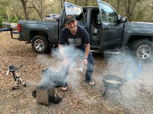 [If 2 stoves aren't enough, Phil Royce also cooks on his truck engine]