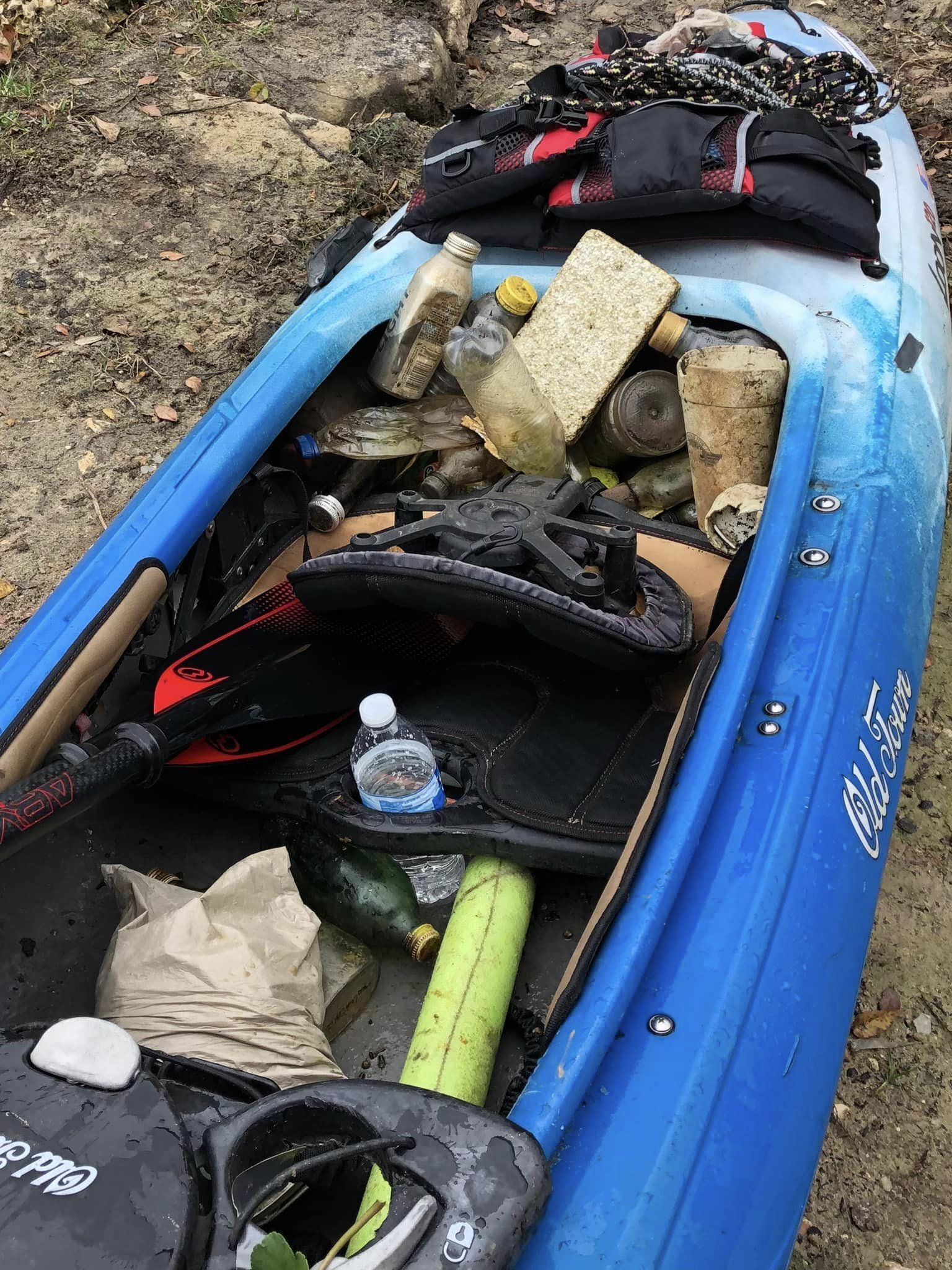 We found a floating cooler. Filled it with trash and mounted it to Bobby’s kayak. --Russell Allen McBride