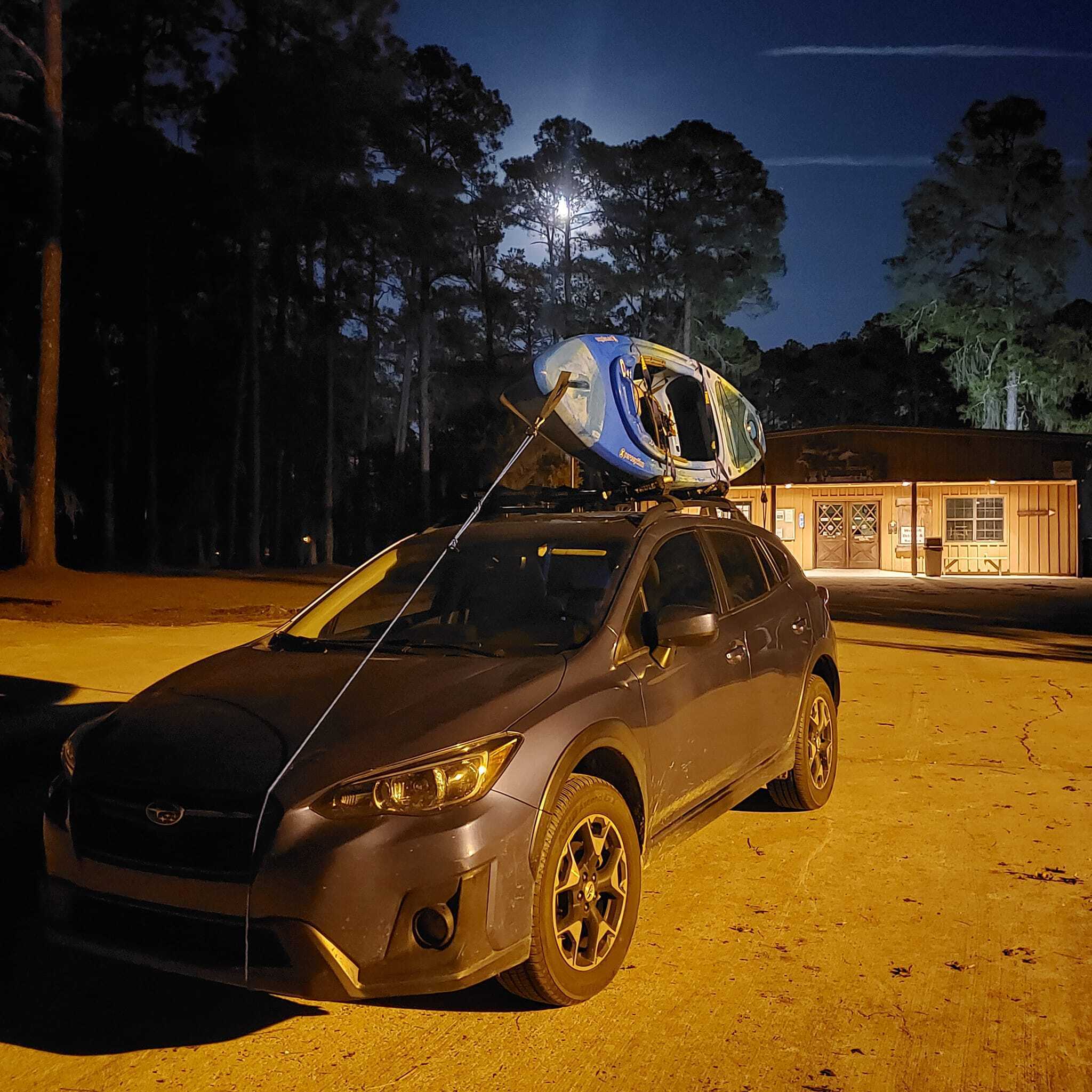 Subaru with kayak --Elizabeth Brunner