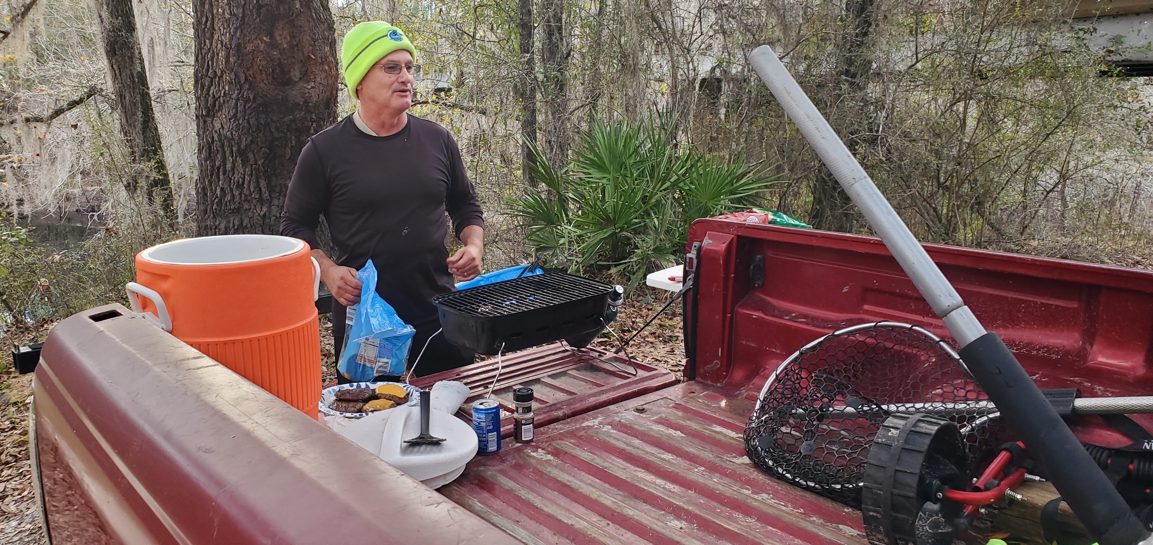 Russell grilling hamburgers at Nankin Boat Ramp, 15:54:59, 30.6749198, -83.3939947