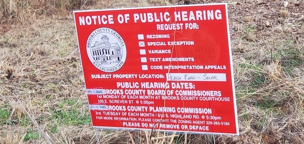 Closeup, rezoning notice sign, 17:43:39, 30.9510626, -83.4834273