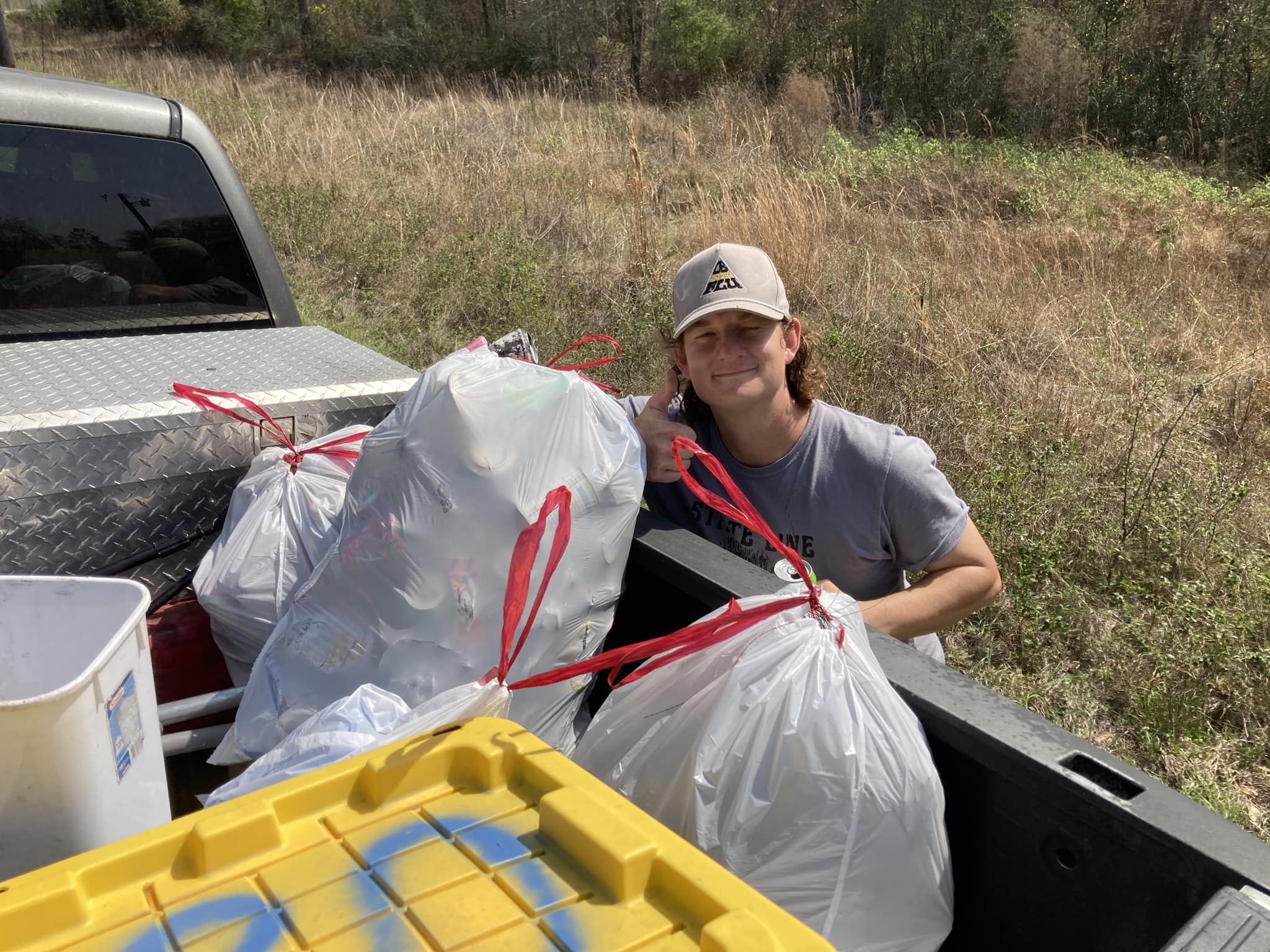 Trash bags with Bird Chamberlain --Gretchen Quarterman