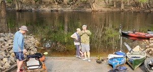 [Mayor preparing, Bill Holt of Boy and Girls Club, 18-foot canoe from Mark Wisenbaker, 08:43:01, 30.8515573, -83.3472605]