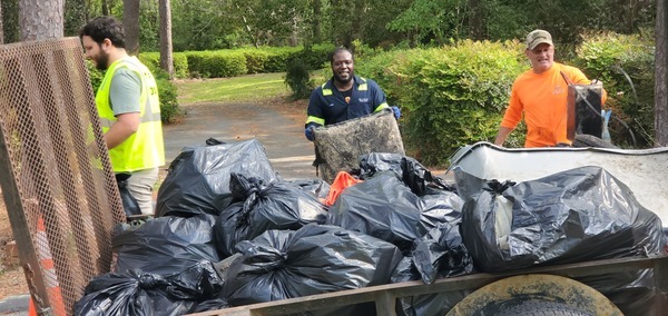 Engineer Ben O'Dowd, Joe driver of trash truck, Russell McBride, 2023:03:25 10:36:08, 30.8617542, -83.2987916