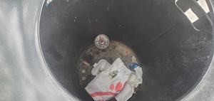 [Less trash in can at street]