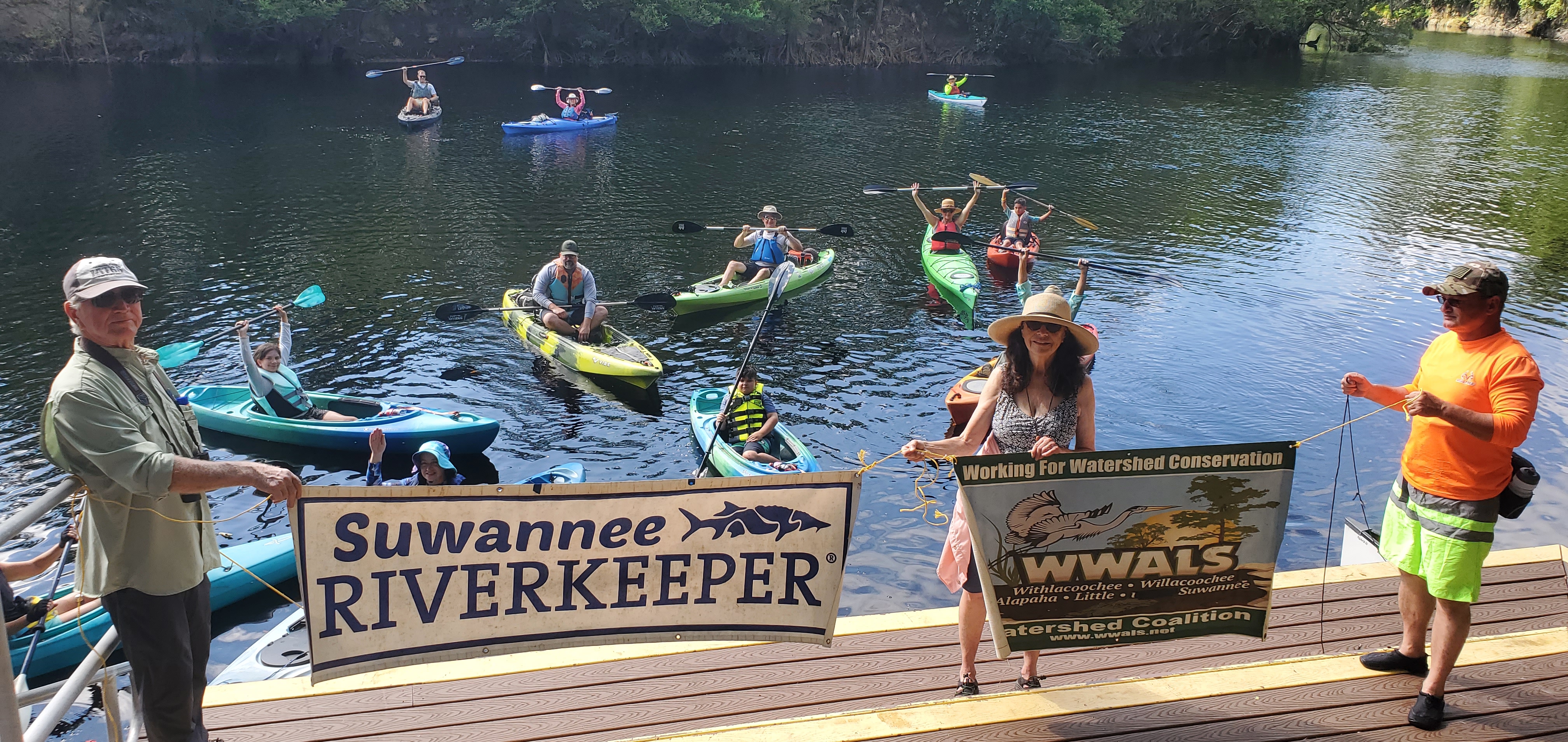 Banners and 15 boats at Big Shoals Tract Launch, 10:12:24, 30.3539804, -82.6870784