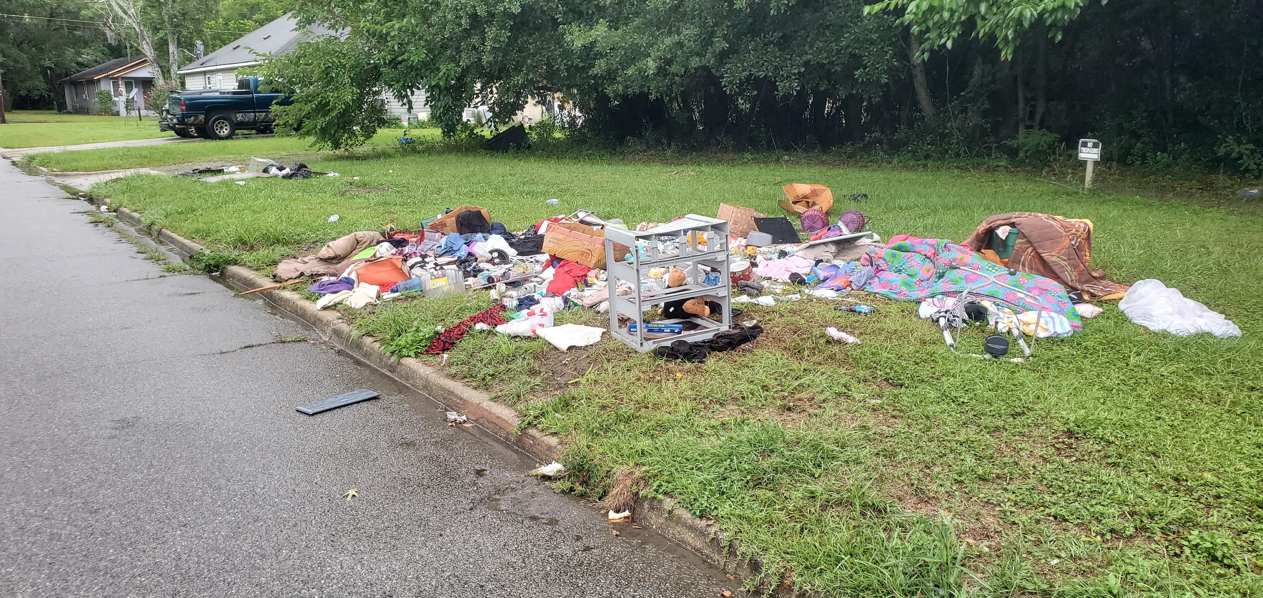 Trash pile, Pullman Street, between S. Oak Street and Pullman Street, 2023:05:23 15:57:15, 30.8215559, -83.2775839