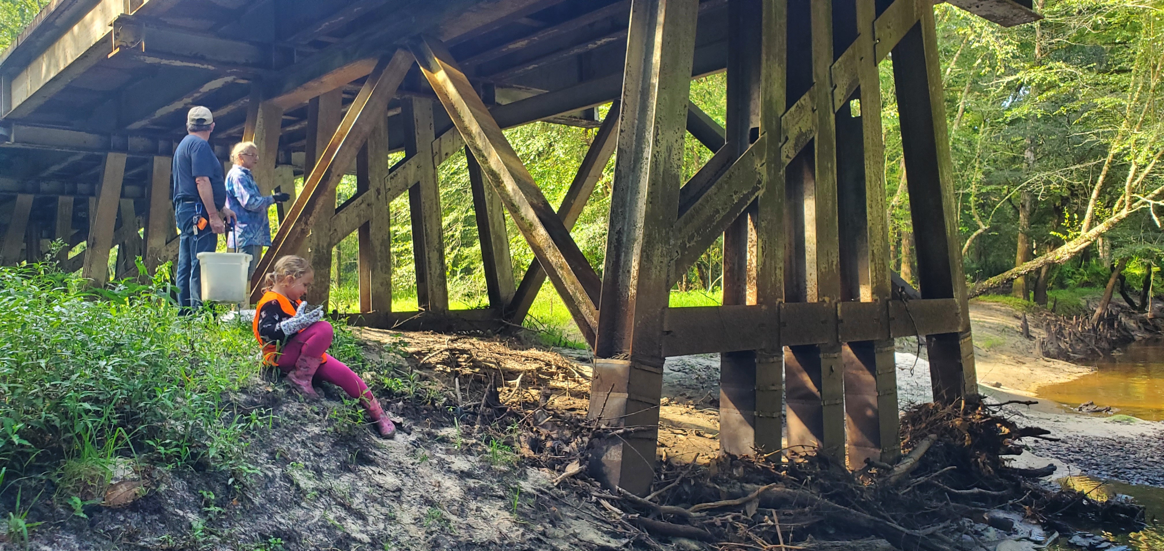 Elleanor sliding down the riverbank, 09:40:26, 30.8632794, -83.3213887