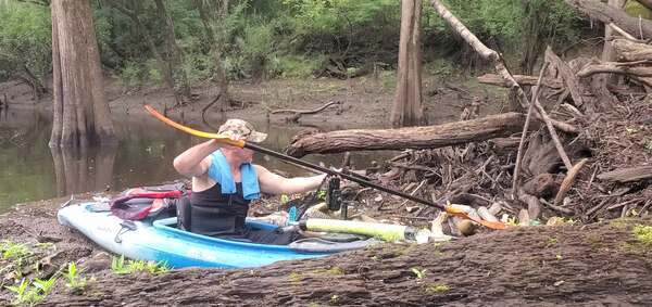 [Movie: Russell and his paddle spoon, trash on the Withlacoochee River, 12:11:11, 30.6949983, -83.4426854 (52M)]