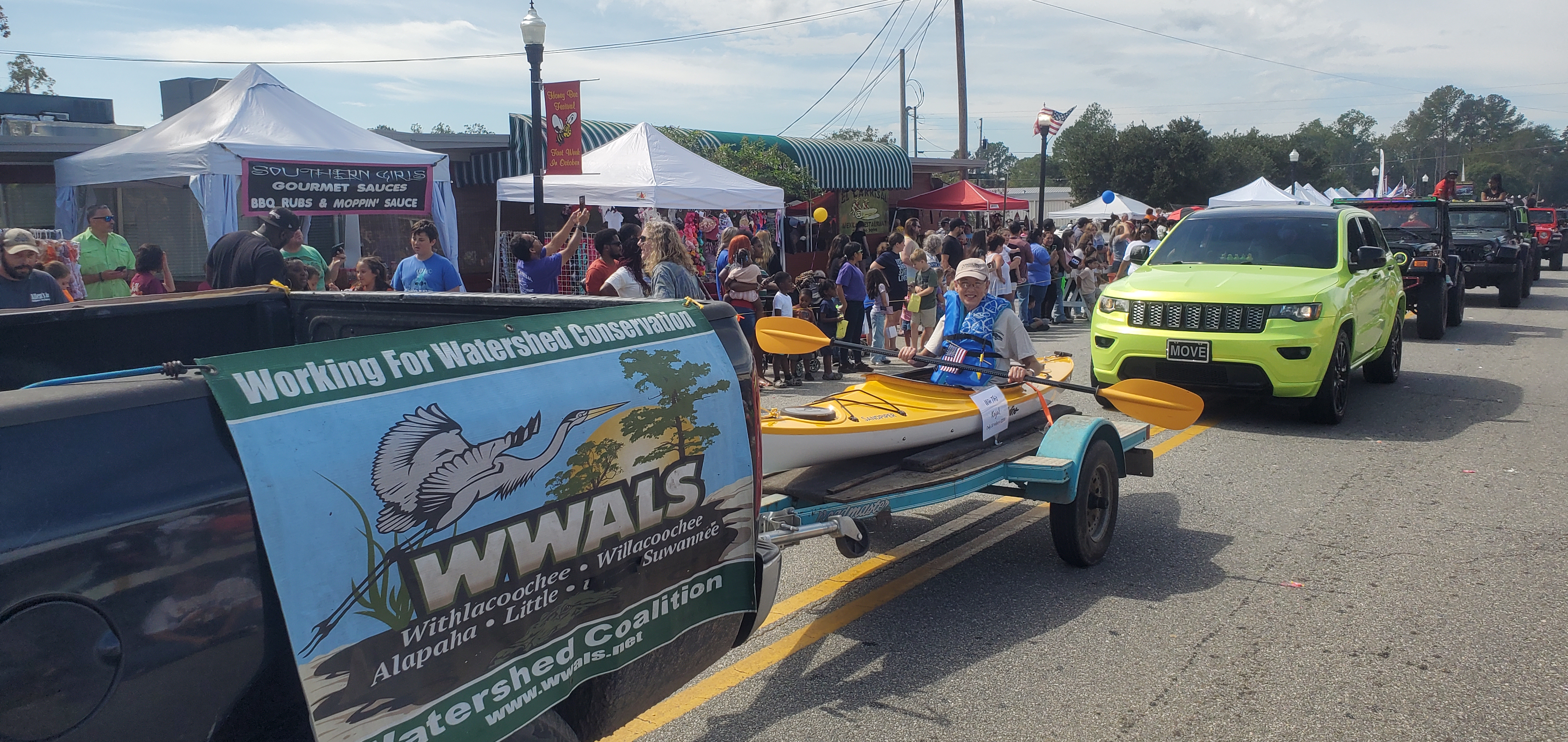 Cindy Vedas paddling in the parade